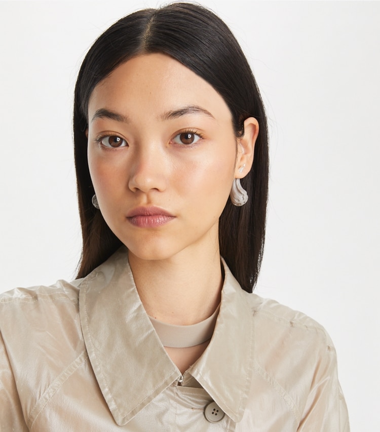 Tory Burch designer earrings Logo Drop Front-Back Earring in Light Silver / Gray accessory on model