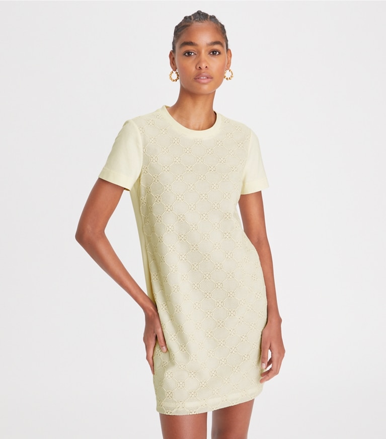 https://s7.toryburch.com/is/image/ToryBurch/style/logo-lace-t-shirt-dress-on-model-detail.TB_148467_104_20230117_OMDET.pdp-767x872.jpg