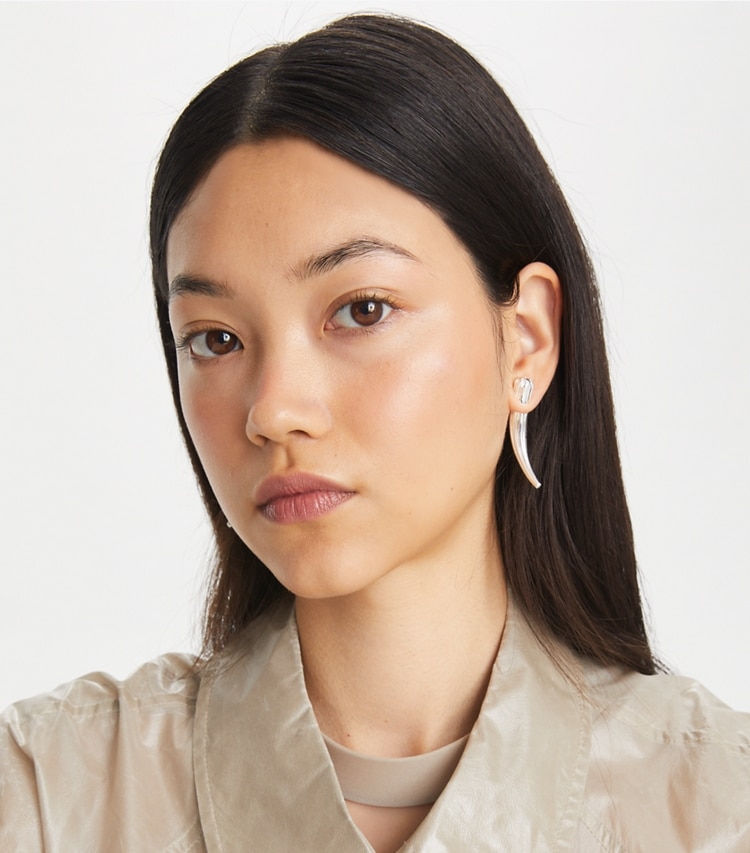 Tory Burch designer earrings Logo Spike Front-Back Earring in Light Silver accessory on model