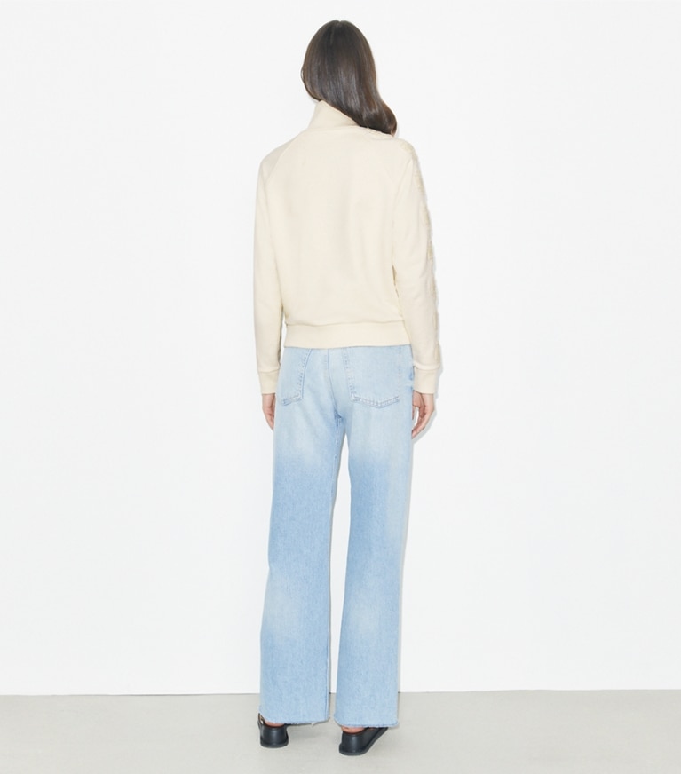 Tory Burch designer strickware Logo-Sweatshirt aus Frottee mit halbem Reißverschluss in New Ivory / New Ivory front