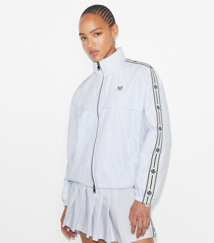 Tory Burch designer jackets Logo Tape Jacket in Light Blue on model detail