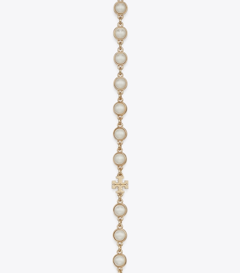 Tory Burch designer colliers Long collier de perles dans Light Brass / Pearl détails