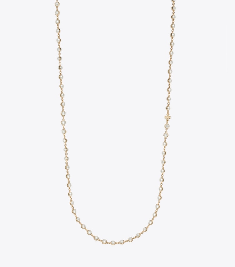 Tory Burch designer colliers Long collier de perles dans Light Brass / Pearl de face