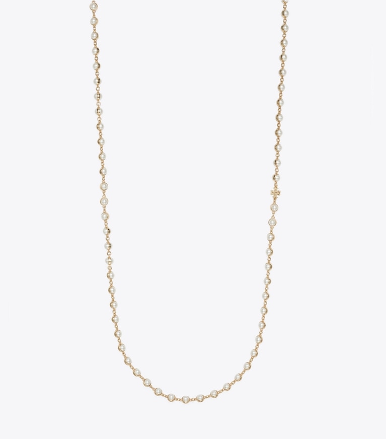 Tory Burch designer colliers Long collier de perles dans Light Brass / Pearl de face