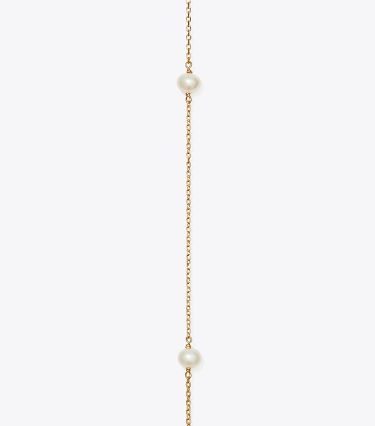 Tory Burch designer colliers Long collier de perles Moondance dans Tory Gold / Pearl détails