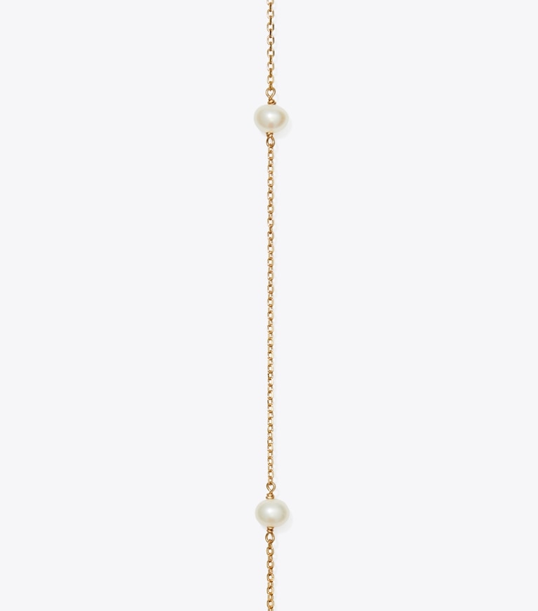 Tory Burch designer colliers Long collier de perles Moondance dans Tory Gold / Pearl détails