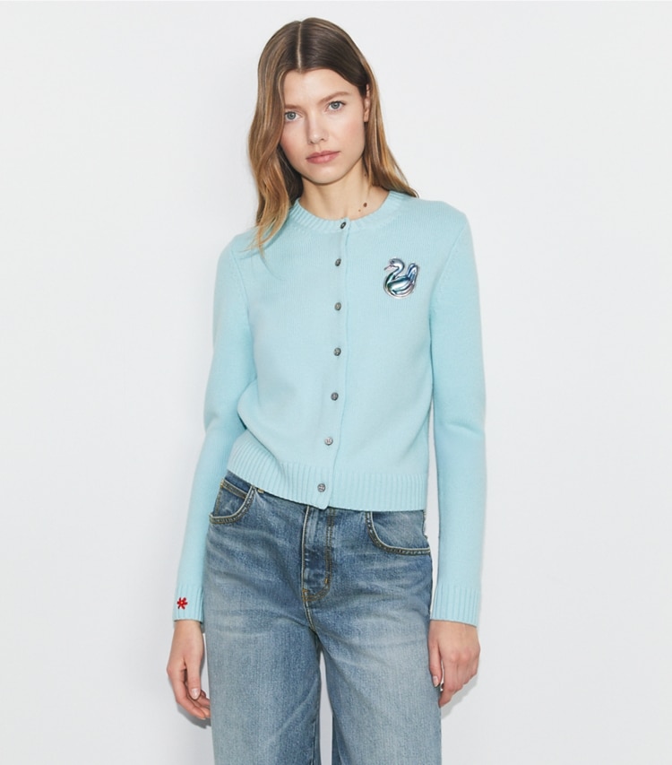 Tory Sport designer sweaters Lucky Duck Merino Wool Cardigan in Pastel Sky on model detail