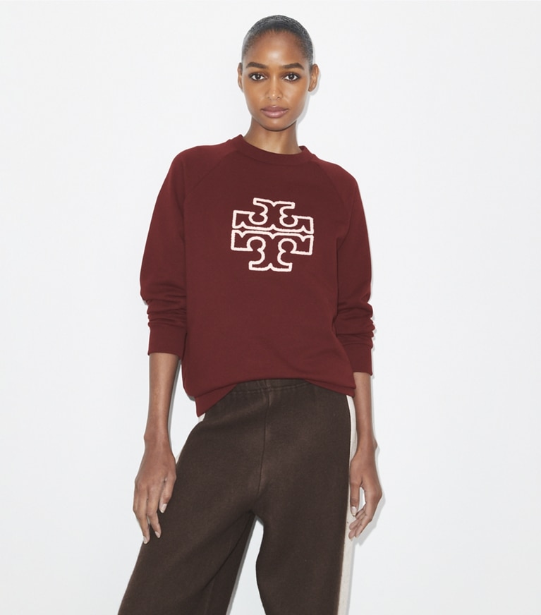 Tory Burch designer maglioni Maglia girocollo in merino e spugna di cotone con maniche raglan in Dark Sangria front