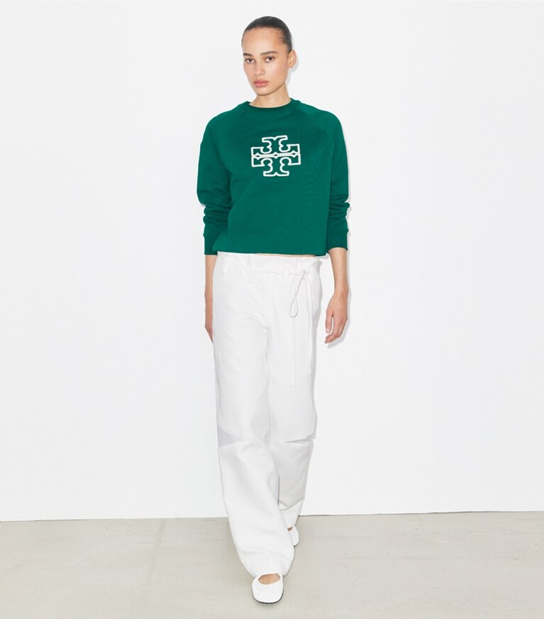 Tory Burch designer maglioni Maglia girocollo in merino e spugna di cotone con maniche raglan in Emerald front