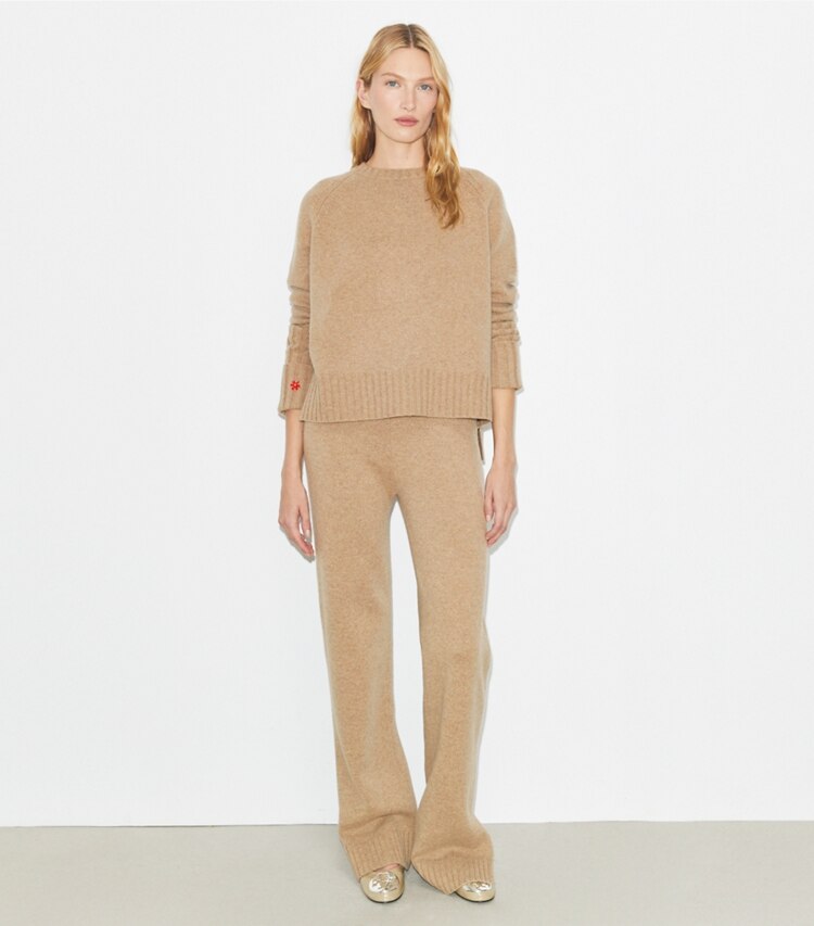 Tory Burch designer maglioni Maglia in lana merino in Melange Oatmeal parte anteriore su modella