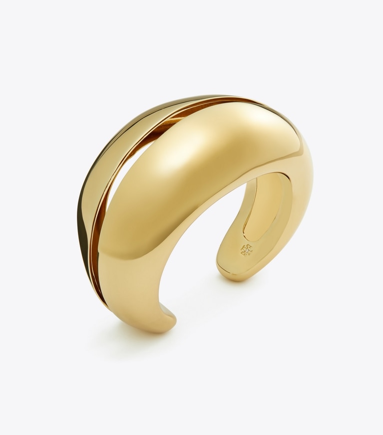 Tory Burch designer bracelets Manchette perforée dans Light Brass détails