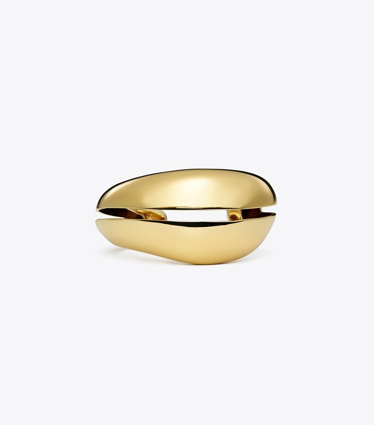 Tory Burch designer bracelets Manchette perforée dans Light Brass de face