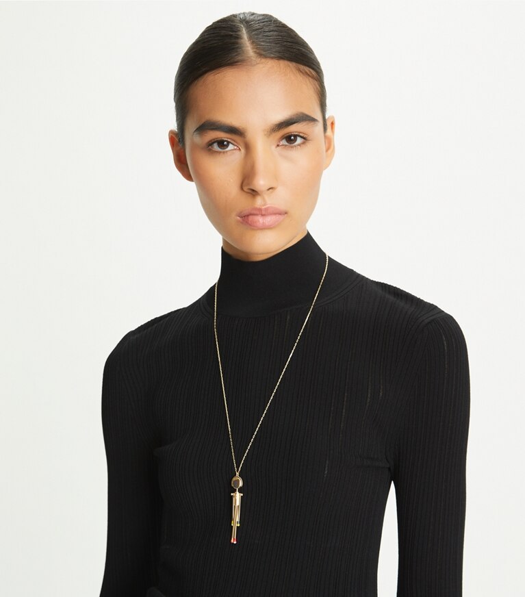 Tory Burch designer necklaces Matchstick Person Pendant in Tory Gold front
