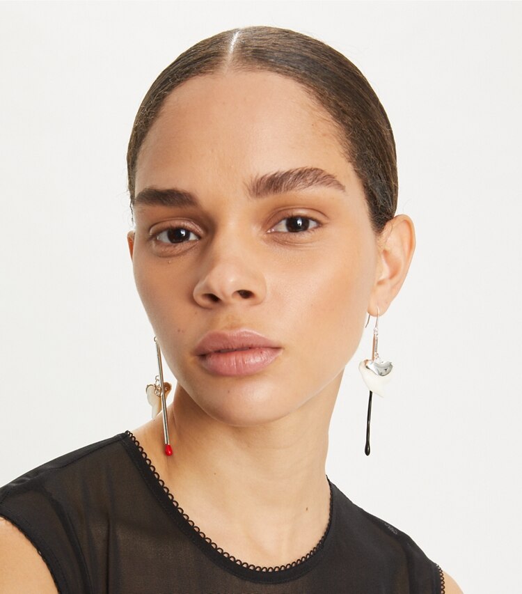 Tory Burch designer earrings Matchstick Shark Tooth Earring in Tory Silver / Ivory / Black accessory on model