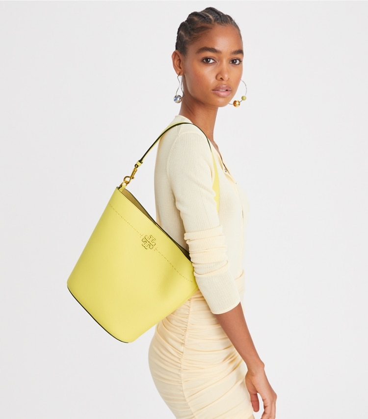 Tory Burch designer hobo bags McGraw Bucket Bag in VINTAGE YELLOW accessory on model