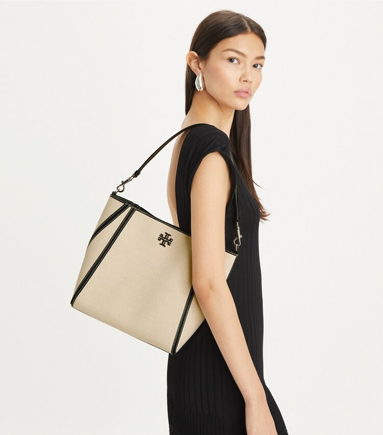 Tory Burch designer hobo bags McGraw Canvas Bucket Bag in Natural Multi accessory on model