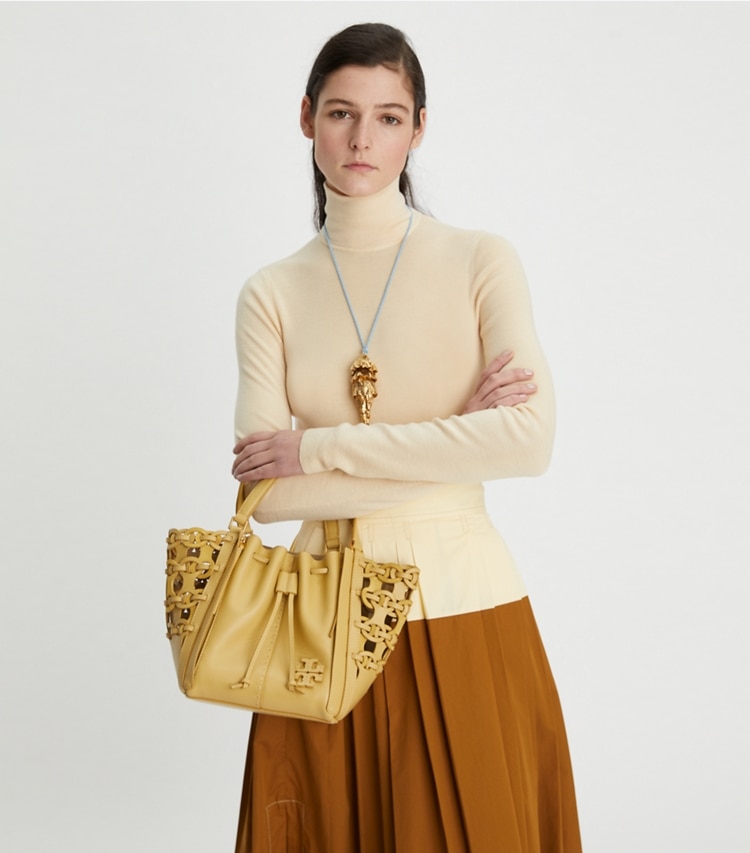 Tory Burch designer satchels McGraw Die-Cut Dragonfly in BEESWAX accessory on model