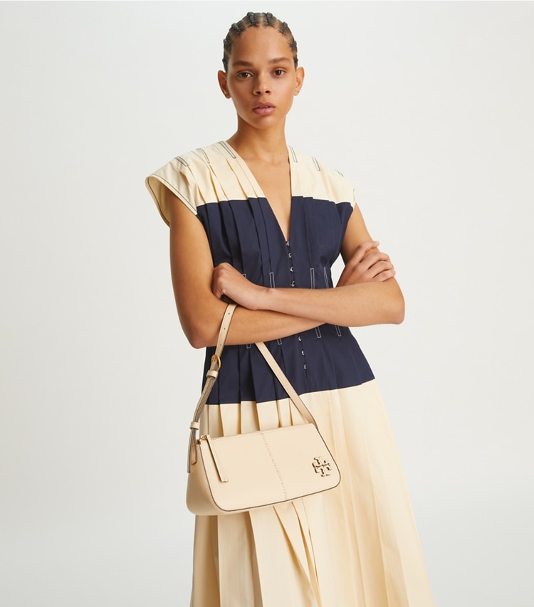 Tory Burch designer shoulder bags McGraw Wedge in BRIE accessory on model