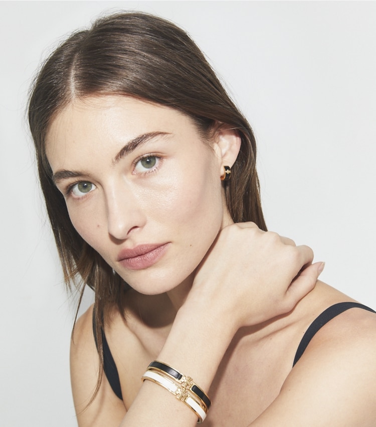 Tory Burch designer bracelets Medium Icon Bracelet in Tory Silver / Gray accessory on model