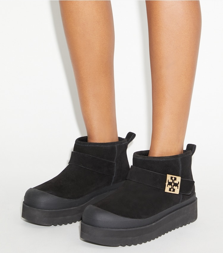 Tory Burch designer boots Mellow Platform Boot in PERFECT BLACK / GOLD accessory on model