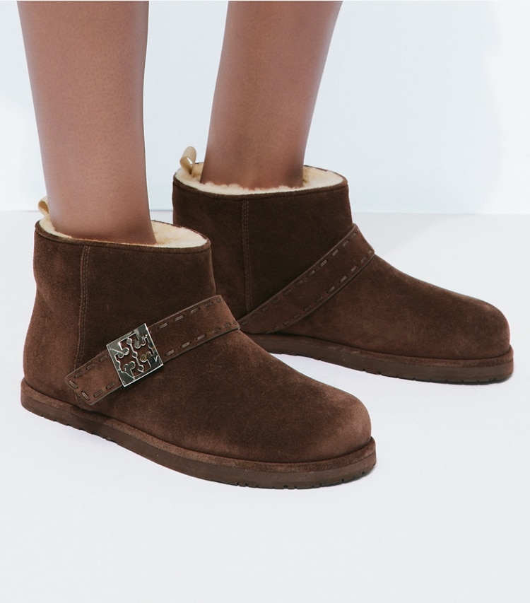Tory Burch designer ankle boots Mellow Shearling Ankle Boot in DARK COCOA / SILVER accessory on model