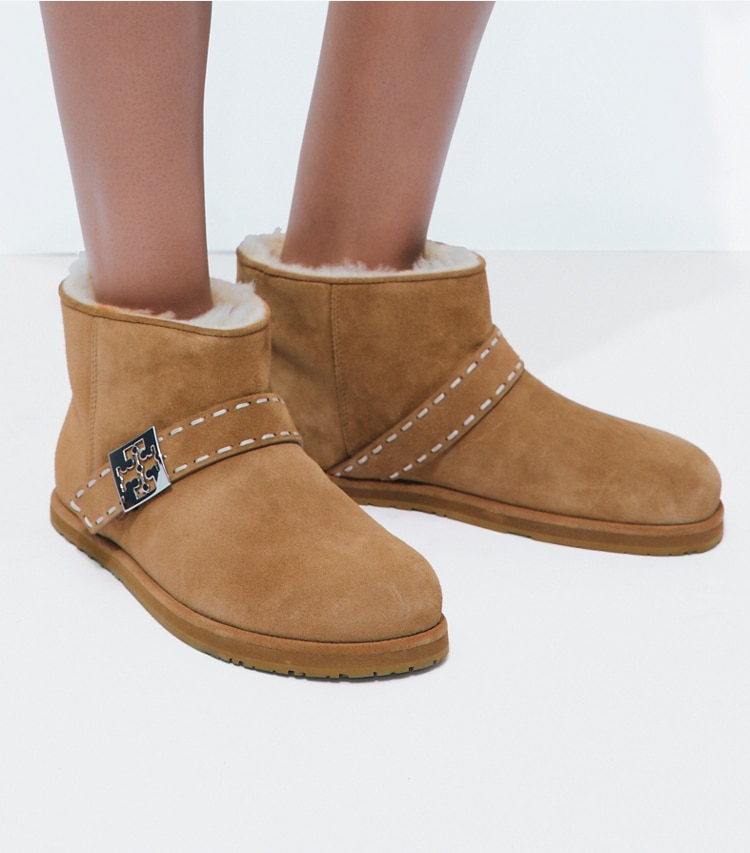 Tory Burch designer ankle boots Mellow Shearling Ankle Boot in TEDDY / SILVER accessory on model