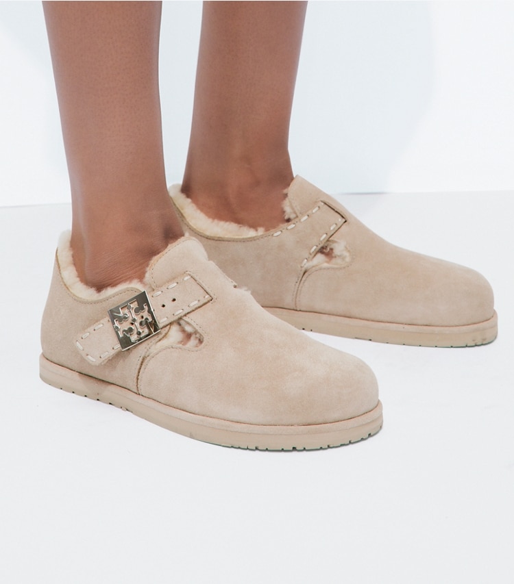 Tory Burch designer flats Mellow Shearling Mary Jane in AVOLA / SILVER accessory on model
