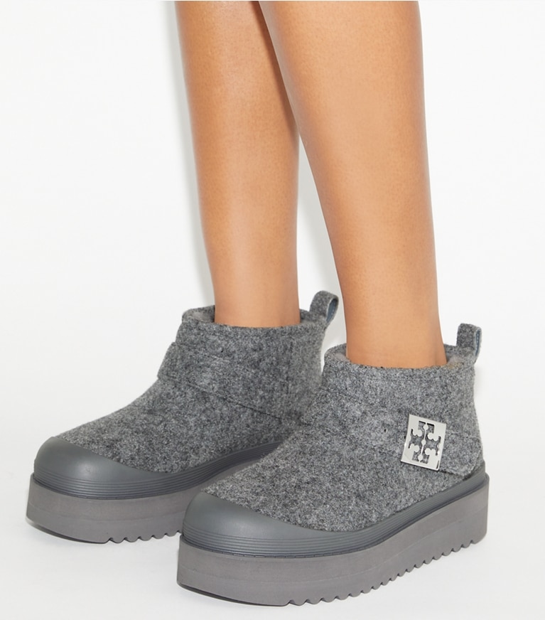 Tory Burch designer ankle boots Mellow Shearling Platform Boot in STORM CLOUD / SILVER angle