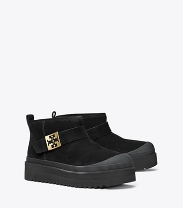 Tory Burch designer boots Mellow Shearling Platform Boot in PERFECT BLACK / GOLD angle