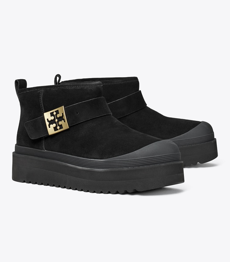 Tory Burch designer boots Mellow Shearling Platform Boot in PERFECT BLACK / GOLD angle