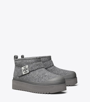 Tory Burch designer ankle boots Mellow Shearling Platform Boot in STORM CLOUD / SILVER angle
