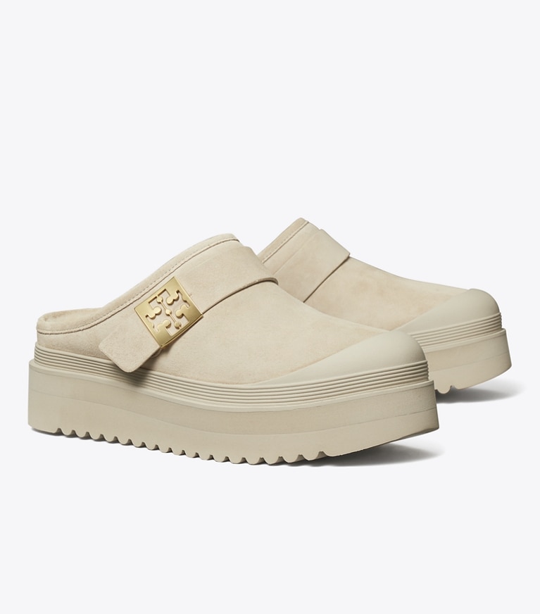 Tory Burch designer flats Mellow Shearling Platform Mule in CALCARE / GOLD angle