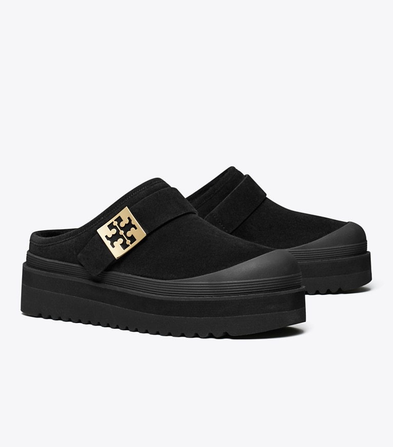 Tory Burch designer flats Mellow Shearling Platform Mule in PERFECT BLACK / GOLD angle