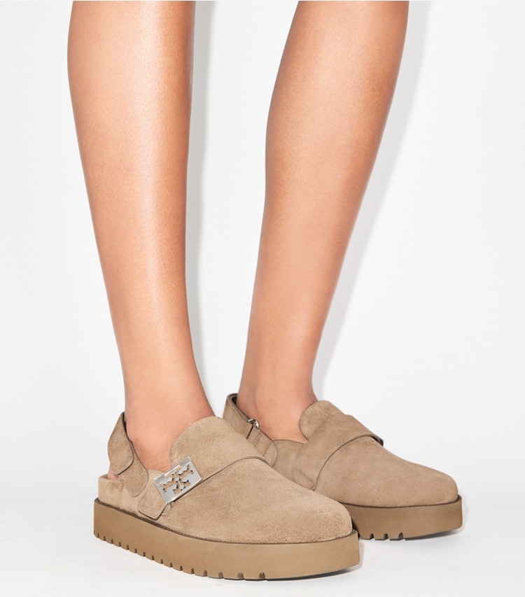 Tory Burch designer flats Mellow Sport Mule in RIVER ROCK / SILVER accessory on model