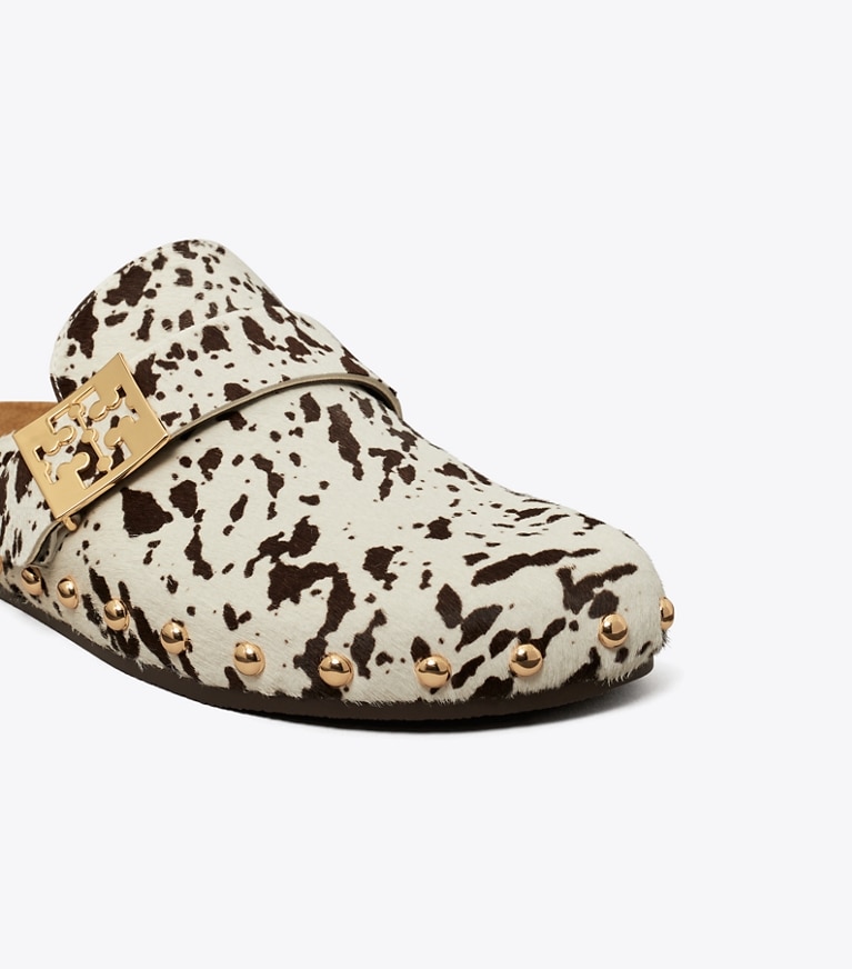 Tory Burch designer flats Mellow Studded Mule in COW PRINT / GOLD angle