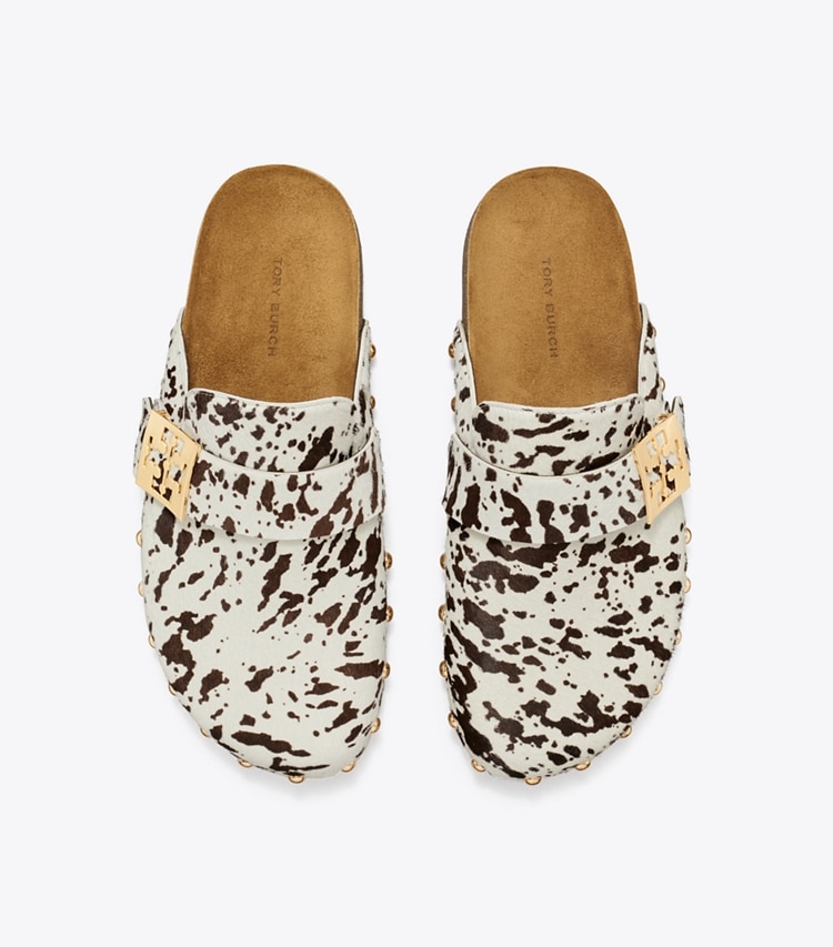 Tory Burch designer flats Mellow Studded Mule in COW PRINT / GOLD overhead