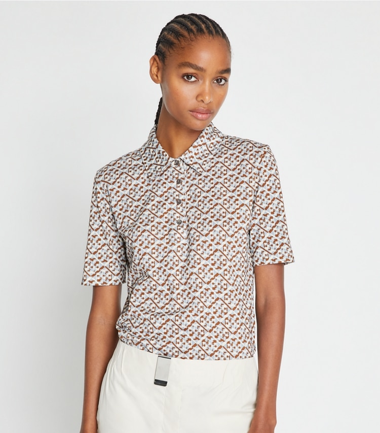 Tory Sport designer tops Mercerized Cotton Polo in Prisimatic T Monogram in Slate Melange on model detail