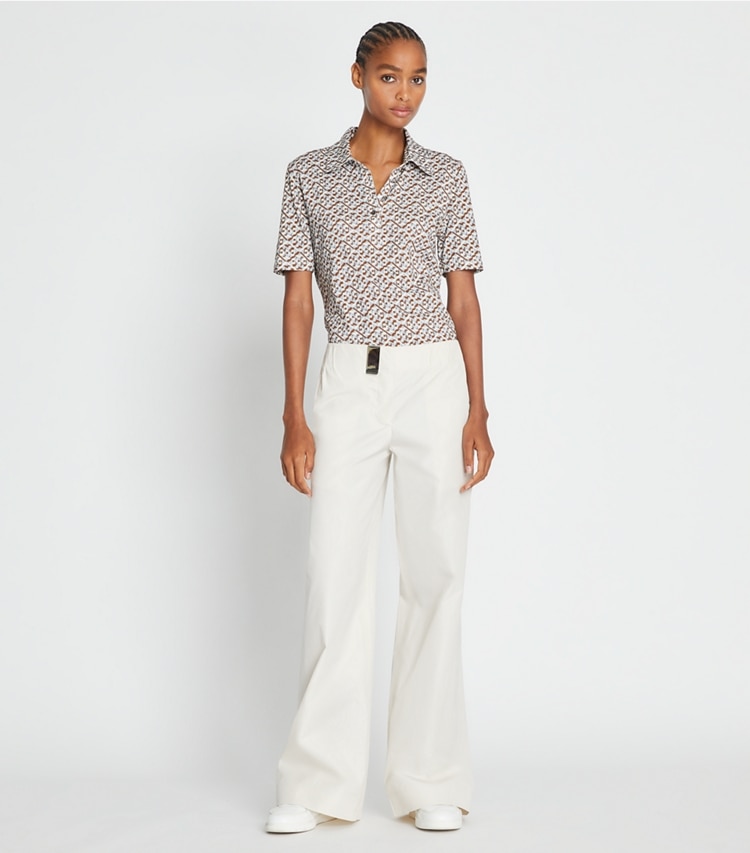 Tory Sport designer tops Mercerized Cotton Polo in Prisimatic T Monogram in Slate Melange on model front