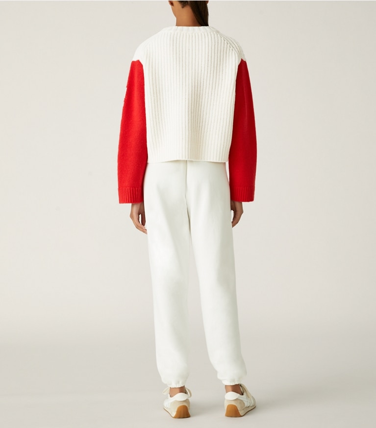 Tory Sport designer sweaters Merino Aprés Ski Sweater in Snow White / Red front