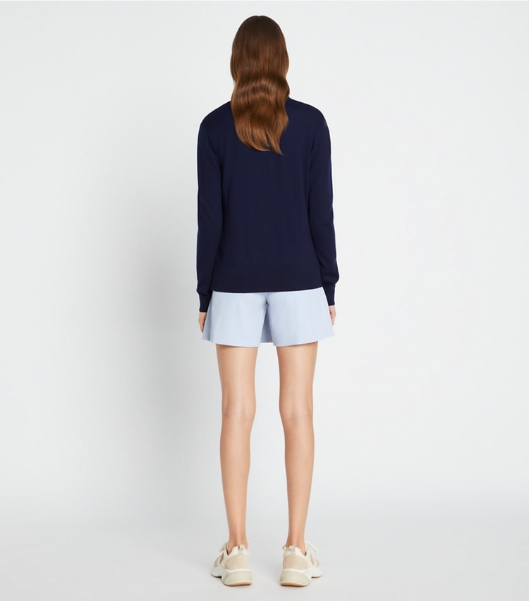 Tory Sport designer sweaters Merino Chevron Sweater in Tory Navy / New Ivory on model back