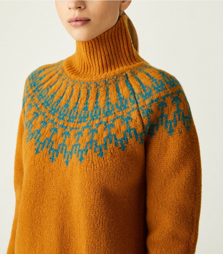 Tory Sport designer sweaters Merino Fair Isle Sweater in Orange Rust Mountain Fair Isle on model detail