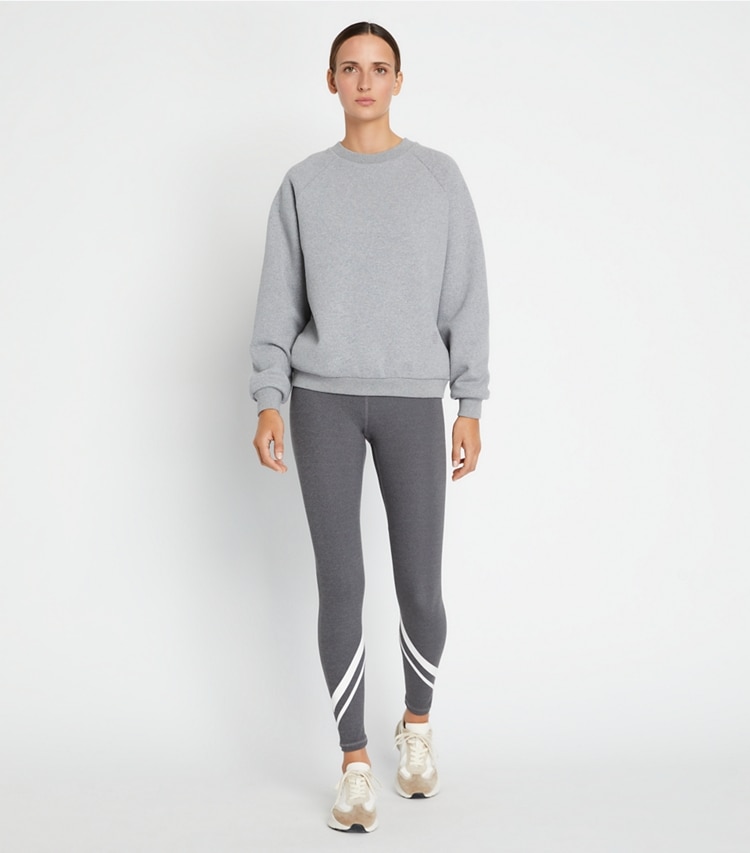 Tory Sport designer sweaters Merino French Terry Raglan Crewneck in Medium Gray Heather on model front
