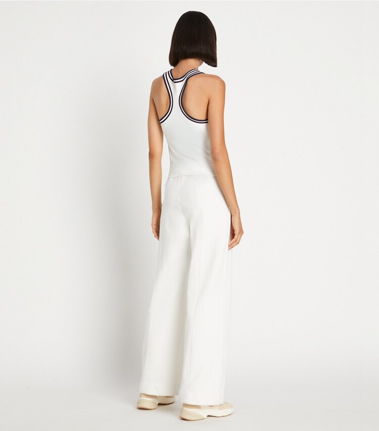 Tory Sport designer bottoms Merino French Terry Wide-Leg Pant in Snow White on model back