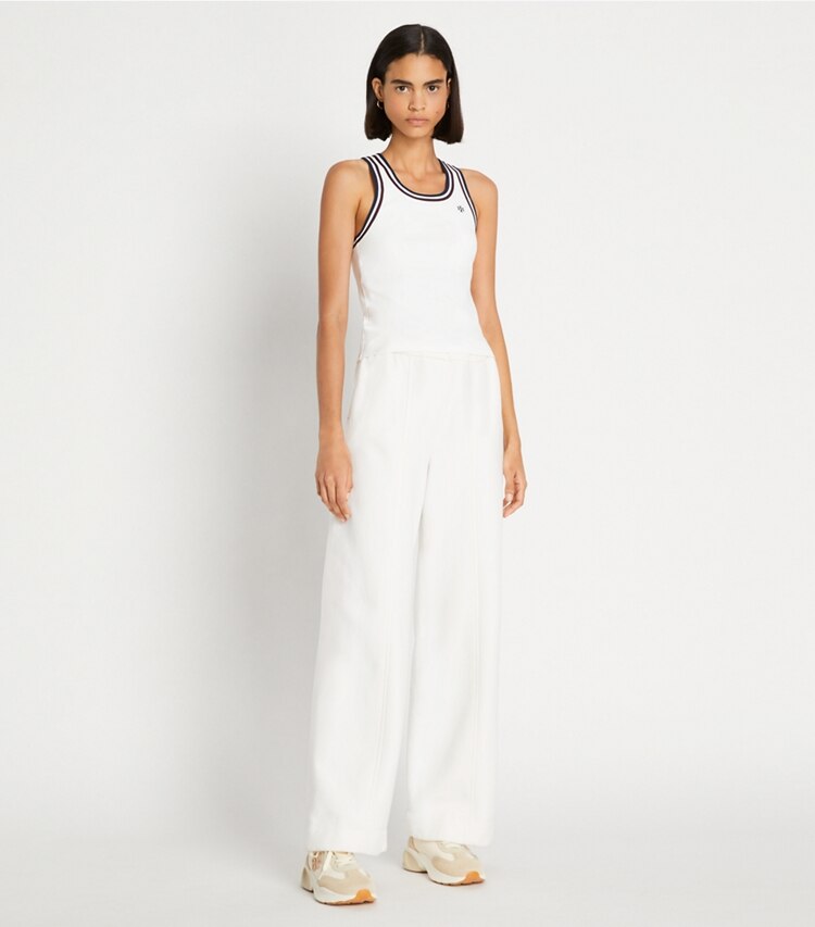 Tory Sport designer bottoms Merino French Terry Wide-Leg Pant in Snow White on model front