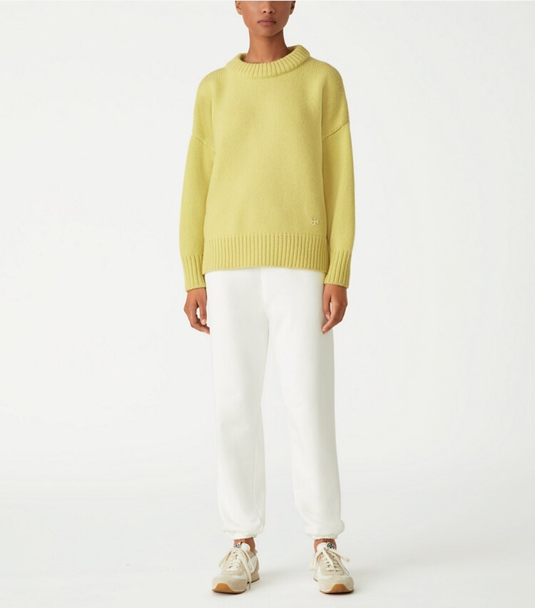 Tory Sport designer sweaters Merino Sweater in Citrea on model front