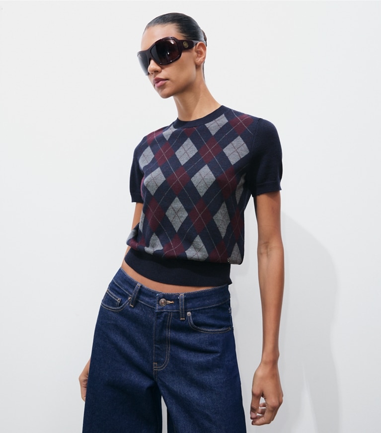 Tory Burch designer sweaters Merino Wool Argyle Sweater in Navy Argyle on model detail