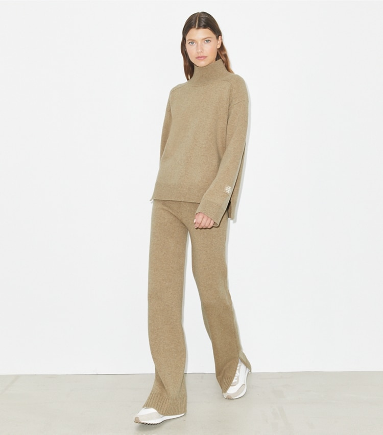 Tory Burch designer sweaters Merino Wool Turtleneck Sweater in Oatmeal Melange on model front