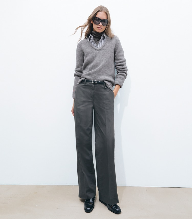 Tory Burch designer sweaters Merino Wool U-Neck Sweater in Cloudy Gray Melange on model front