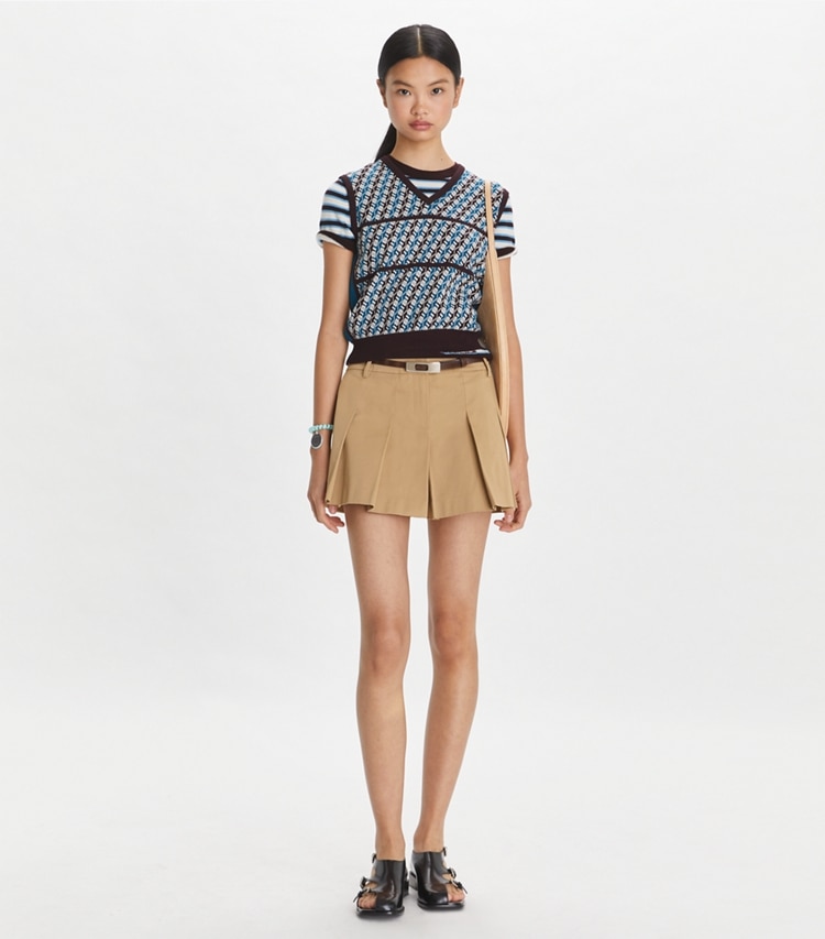 Tory Sport designer bottoms Micro Twill Pleated Short in Chestnut Khaki on model front