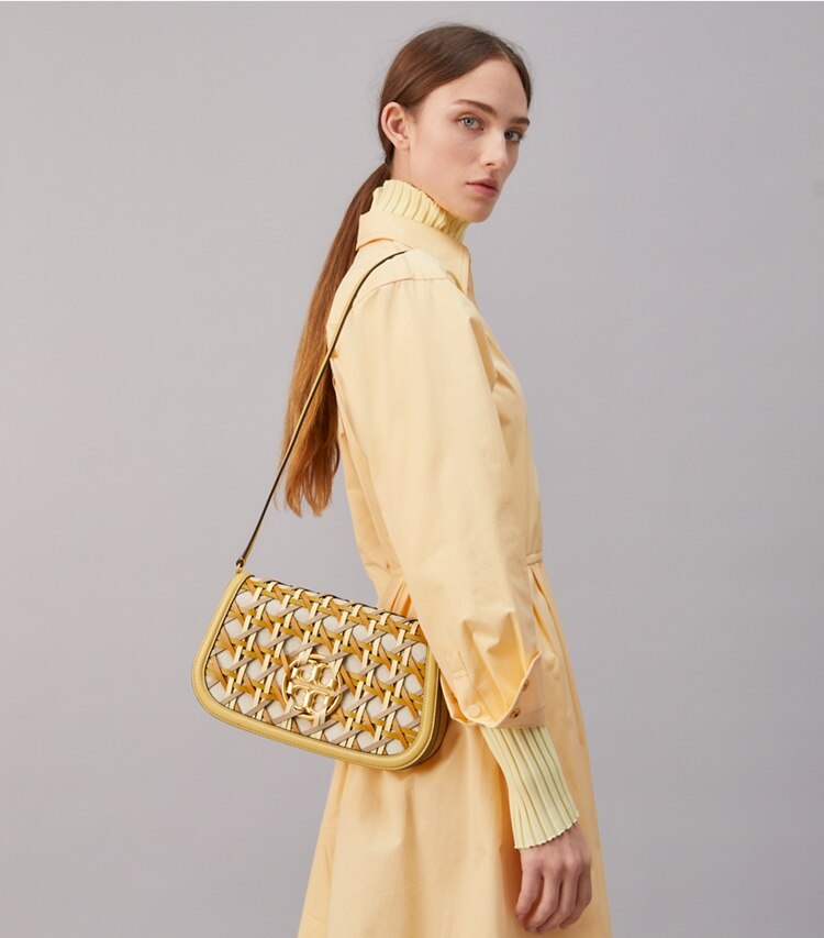 Tory Burch designer clutches Miller Basket-Weave Convertible Shoulder Bag in CORNBREAD accessory on model